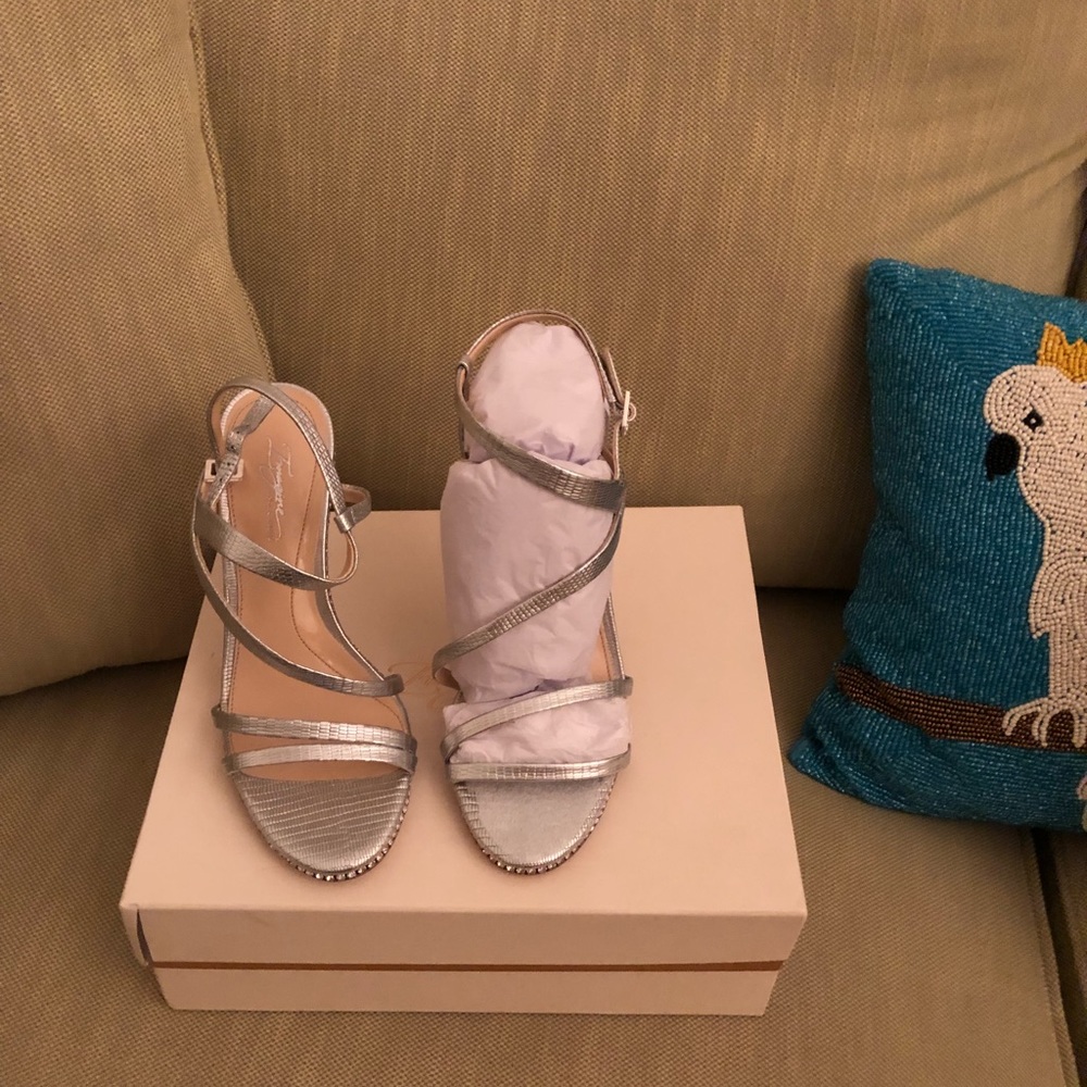 Vince Camuto platinum pumps